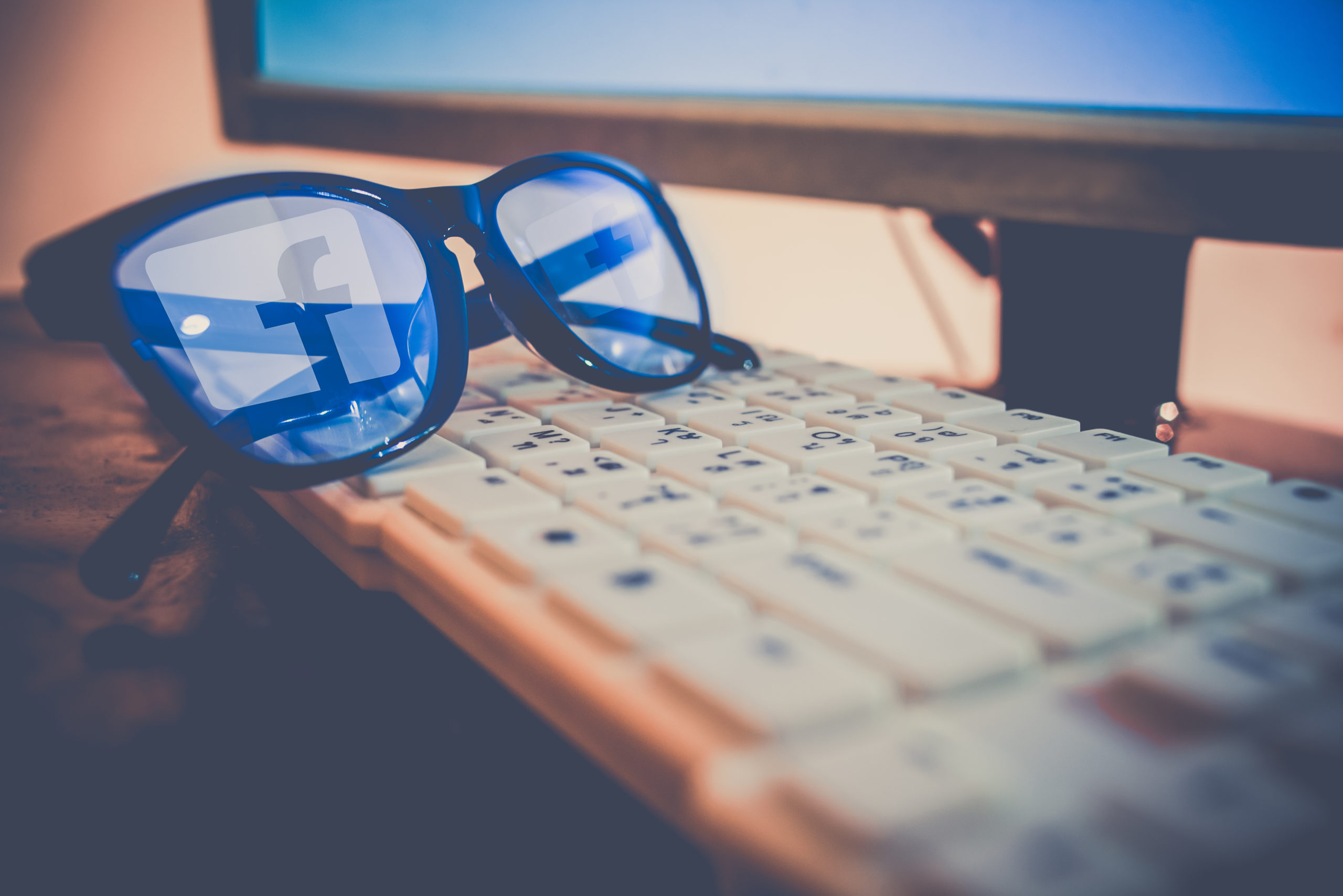 Facebook Logo Reflecting On Glasses