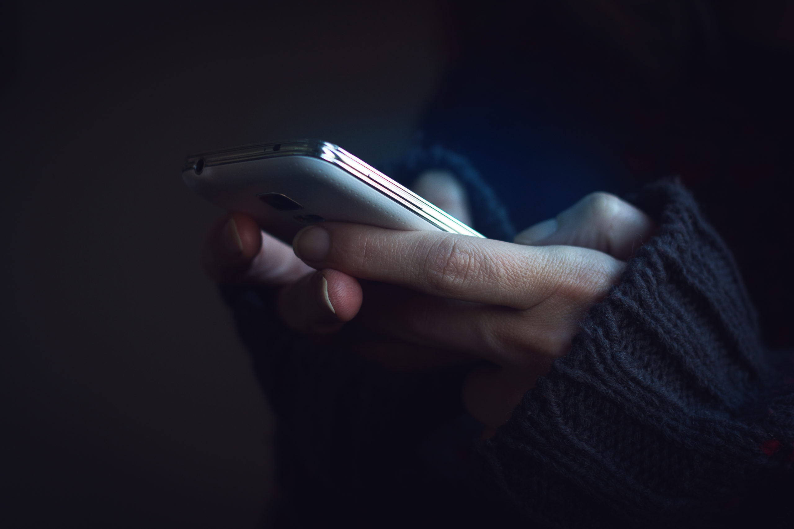 Woman Holding Mobile Phone