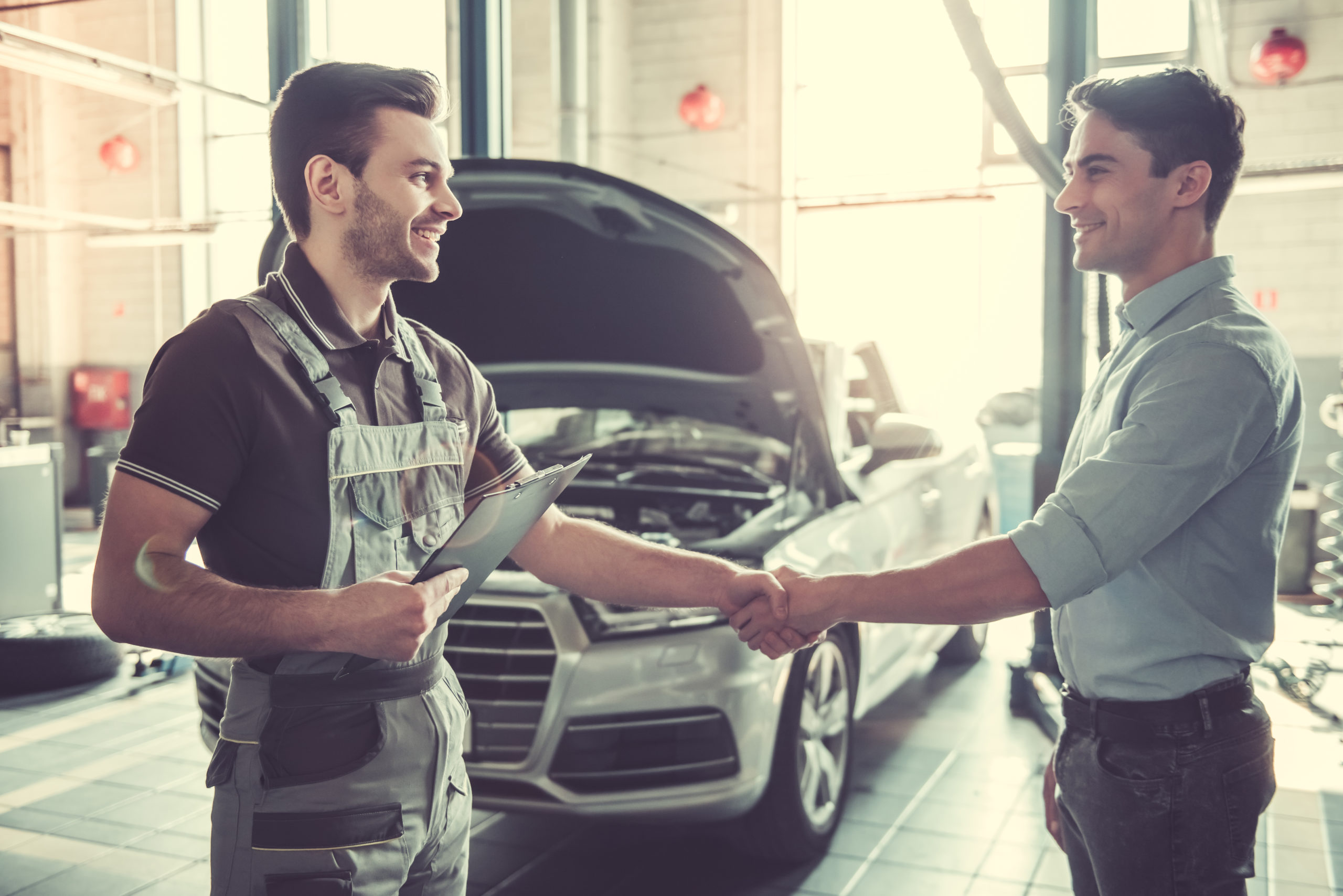 Motor Engineer Shaking Customer Hand