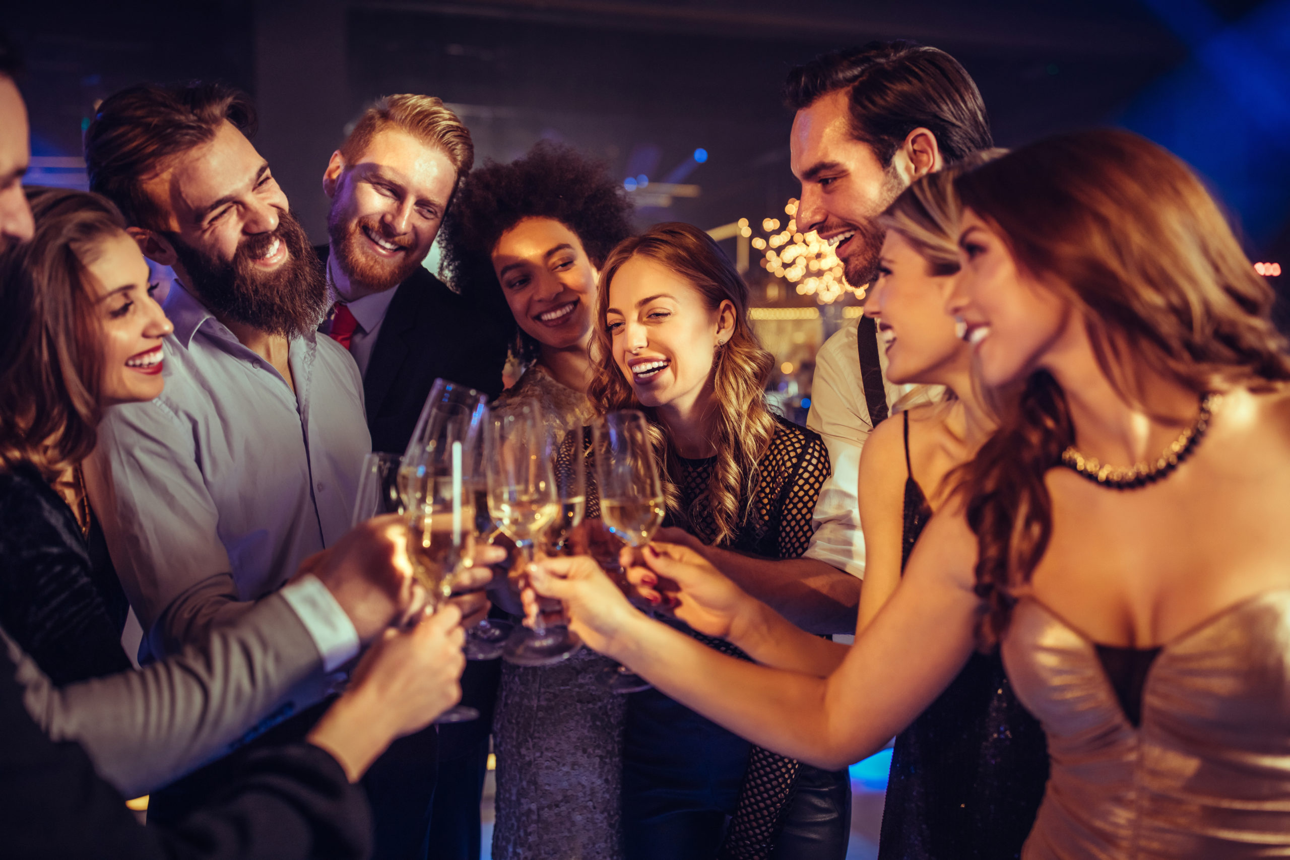 Group Of People Toasting Glasses