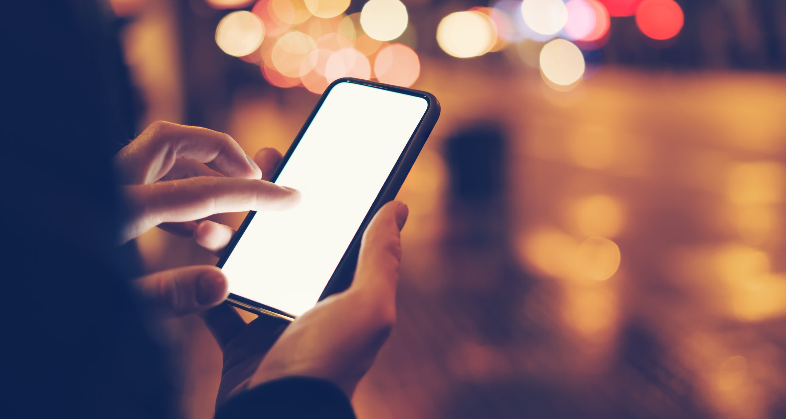 Man Using Smartphone At Night