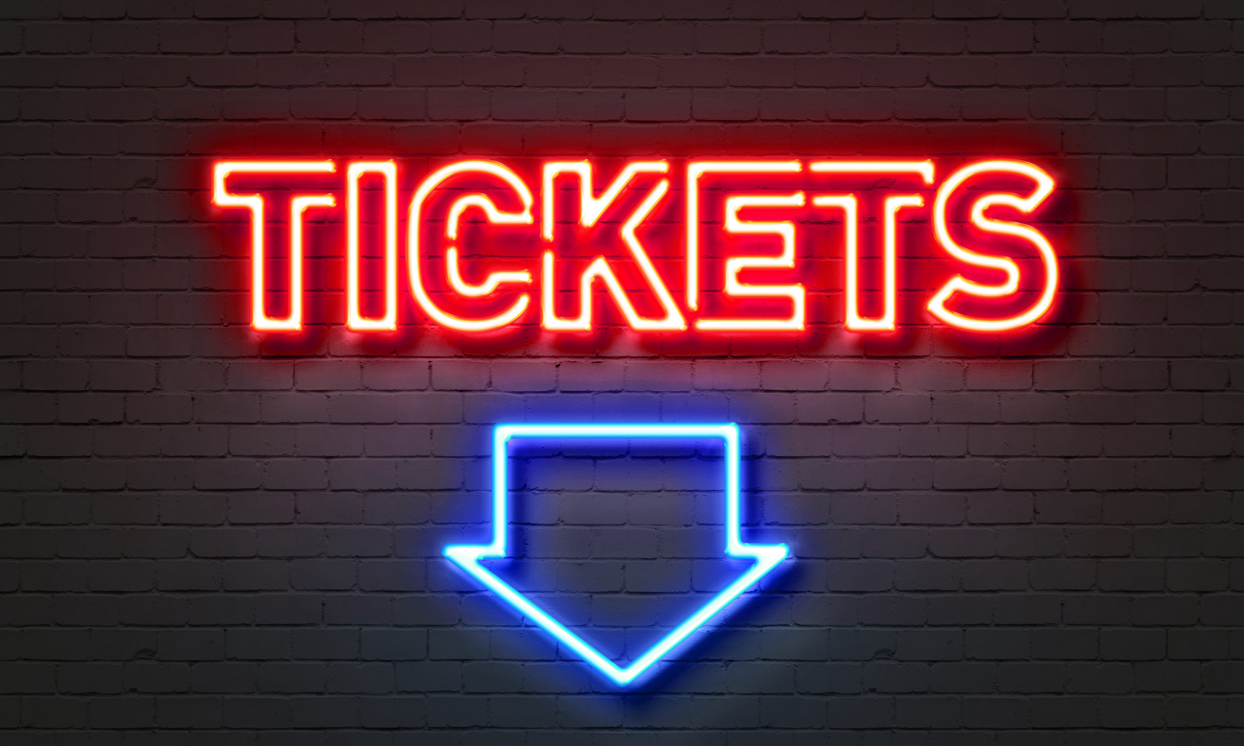 Neon Sign Stating Tickets