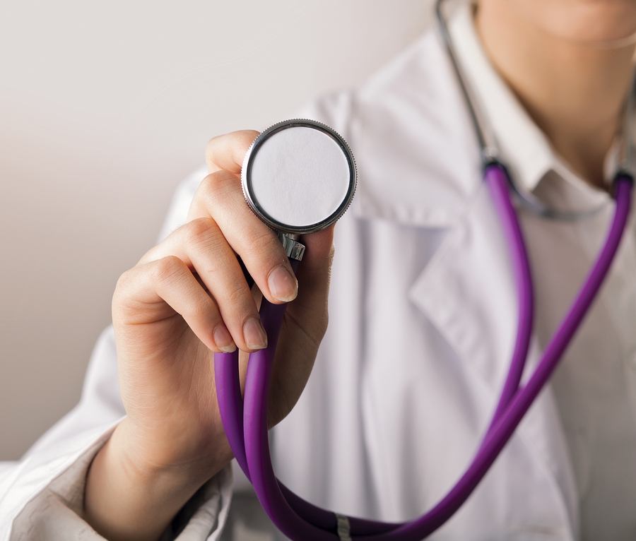 Female Doctor Holding Scethoscope