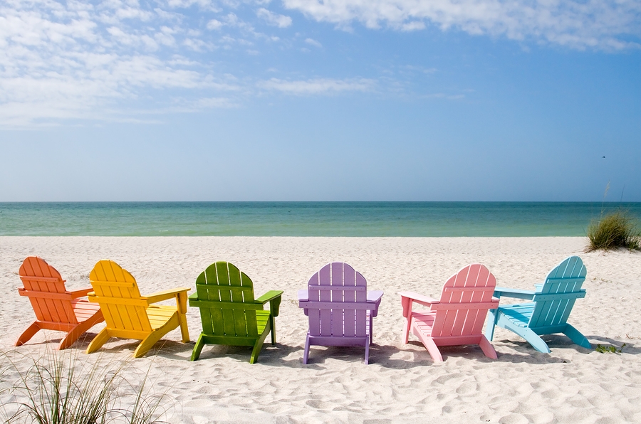 Colourful Deck Chairs on Beach