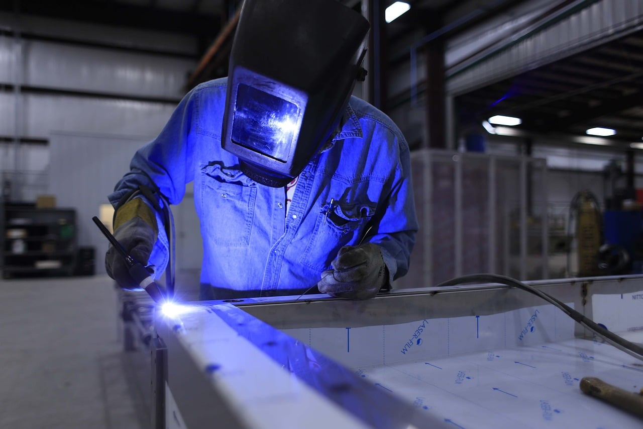 Engineer Welding in Workshop