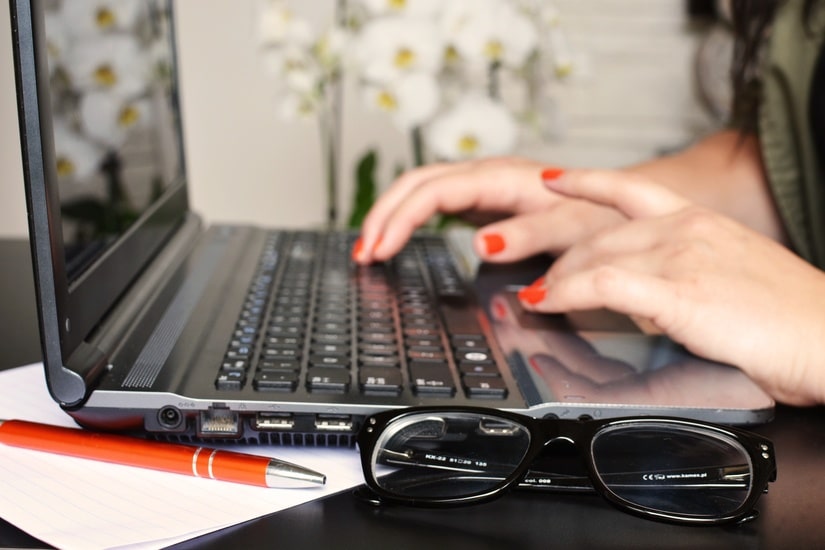 Woman Working On Laptop