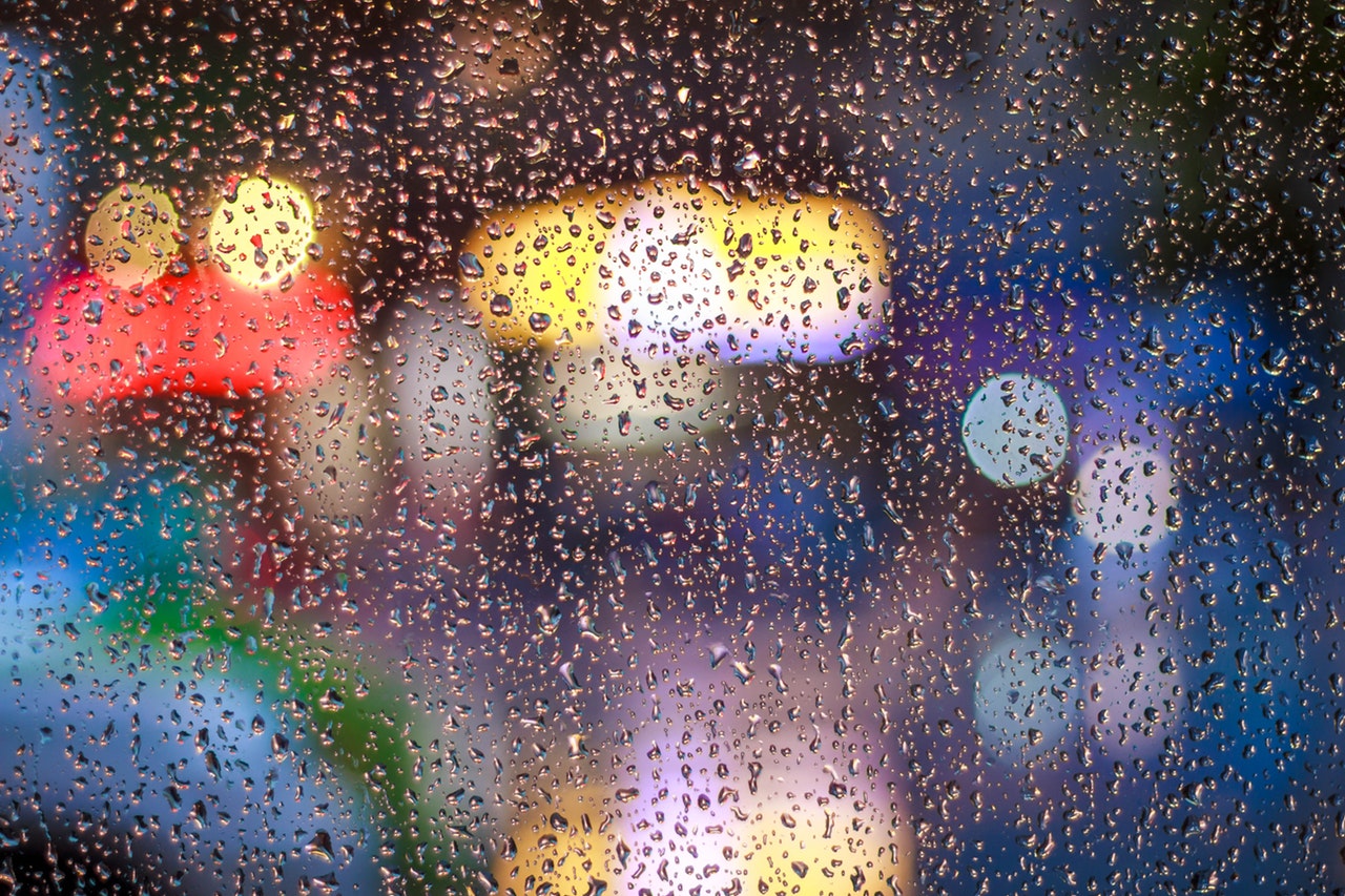 Rainy Window With Bright Lights