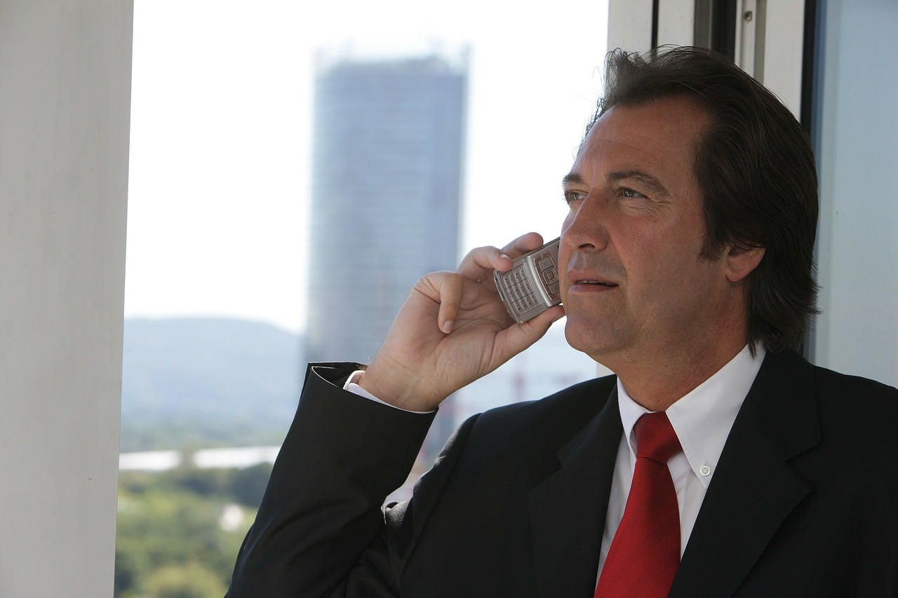 Businessman Speaking On Telephone