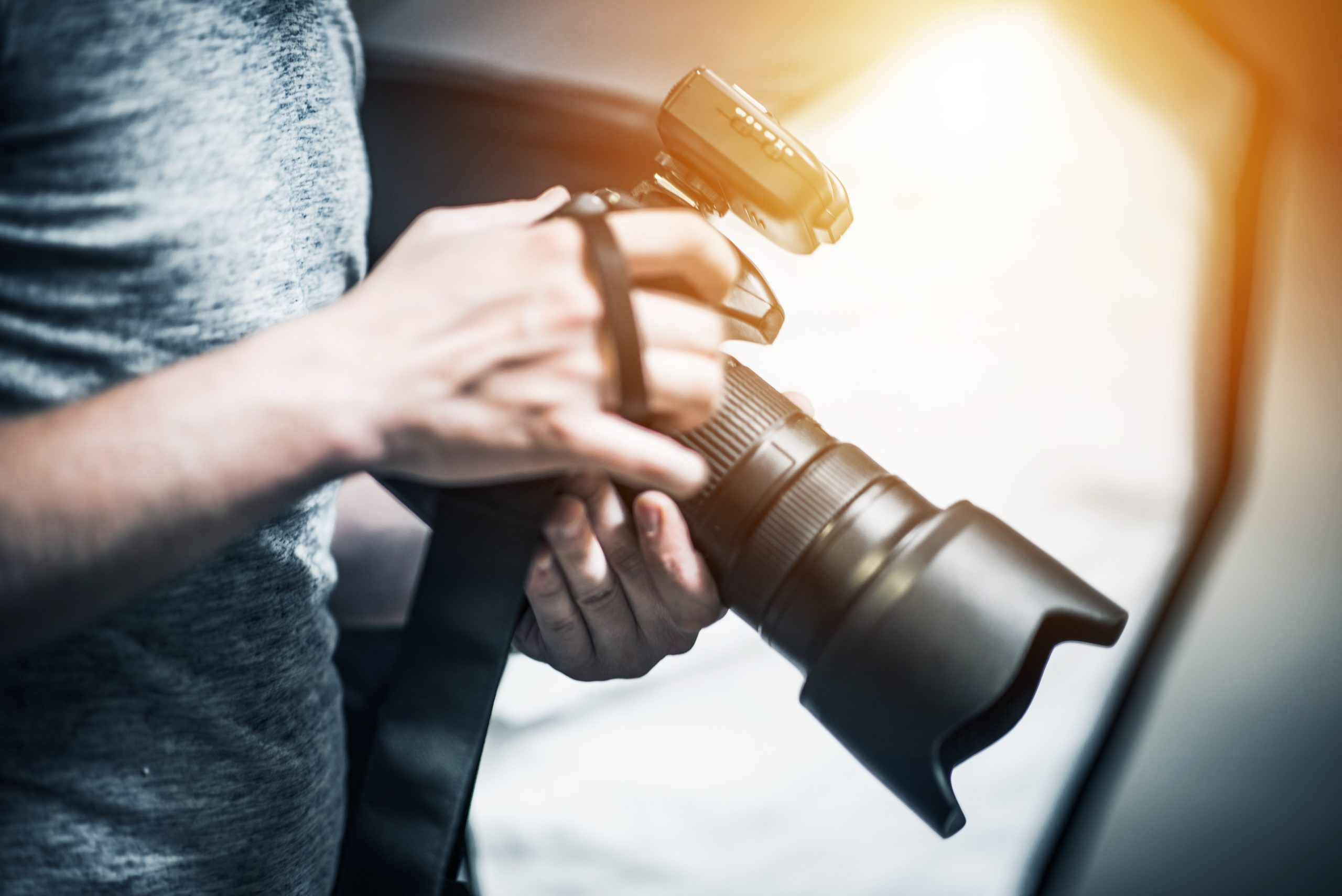 Photographer Holding Camera